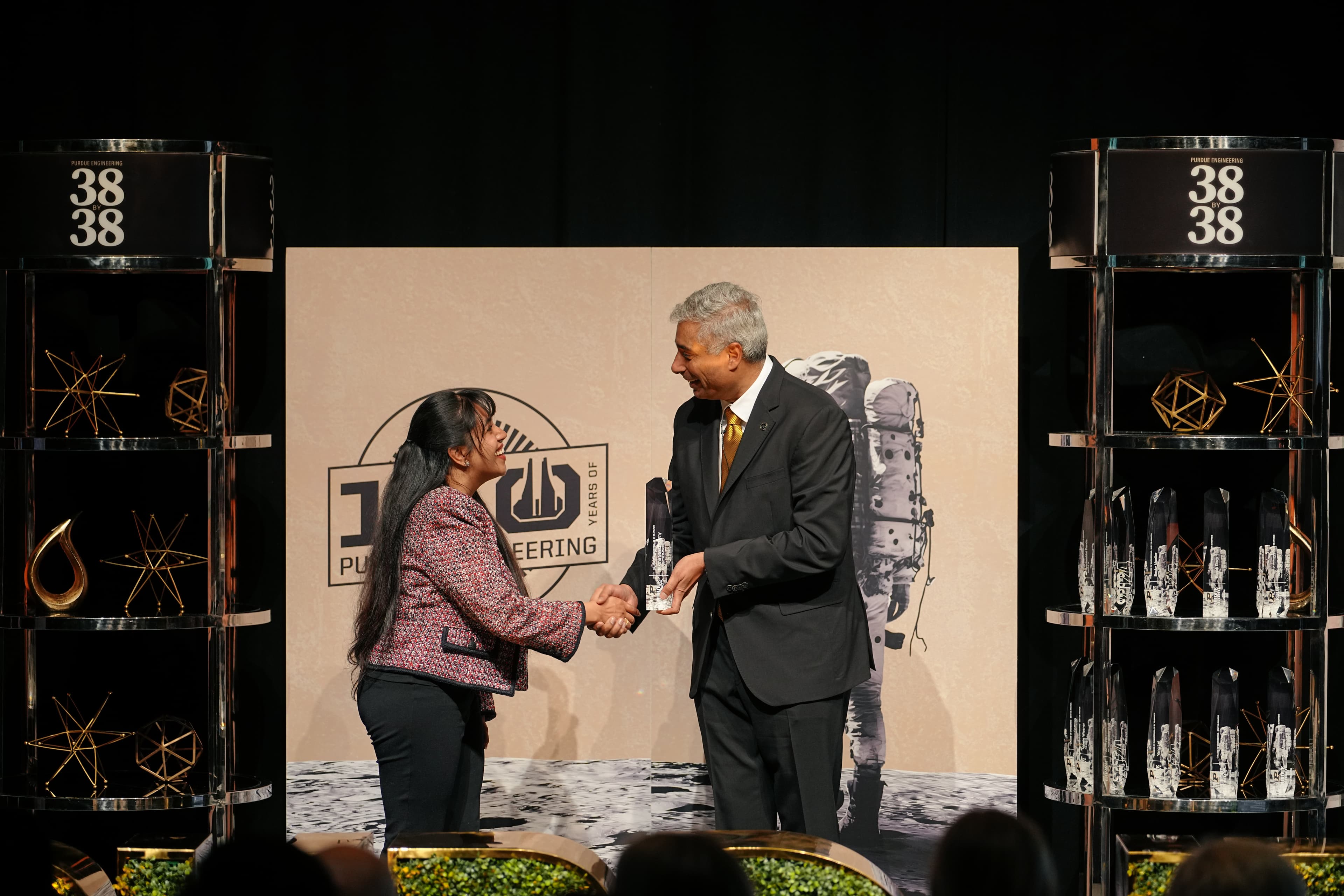 Receiving the Purdue 38 by 38 award from the Dean of Engineering